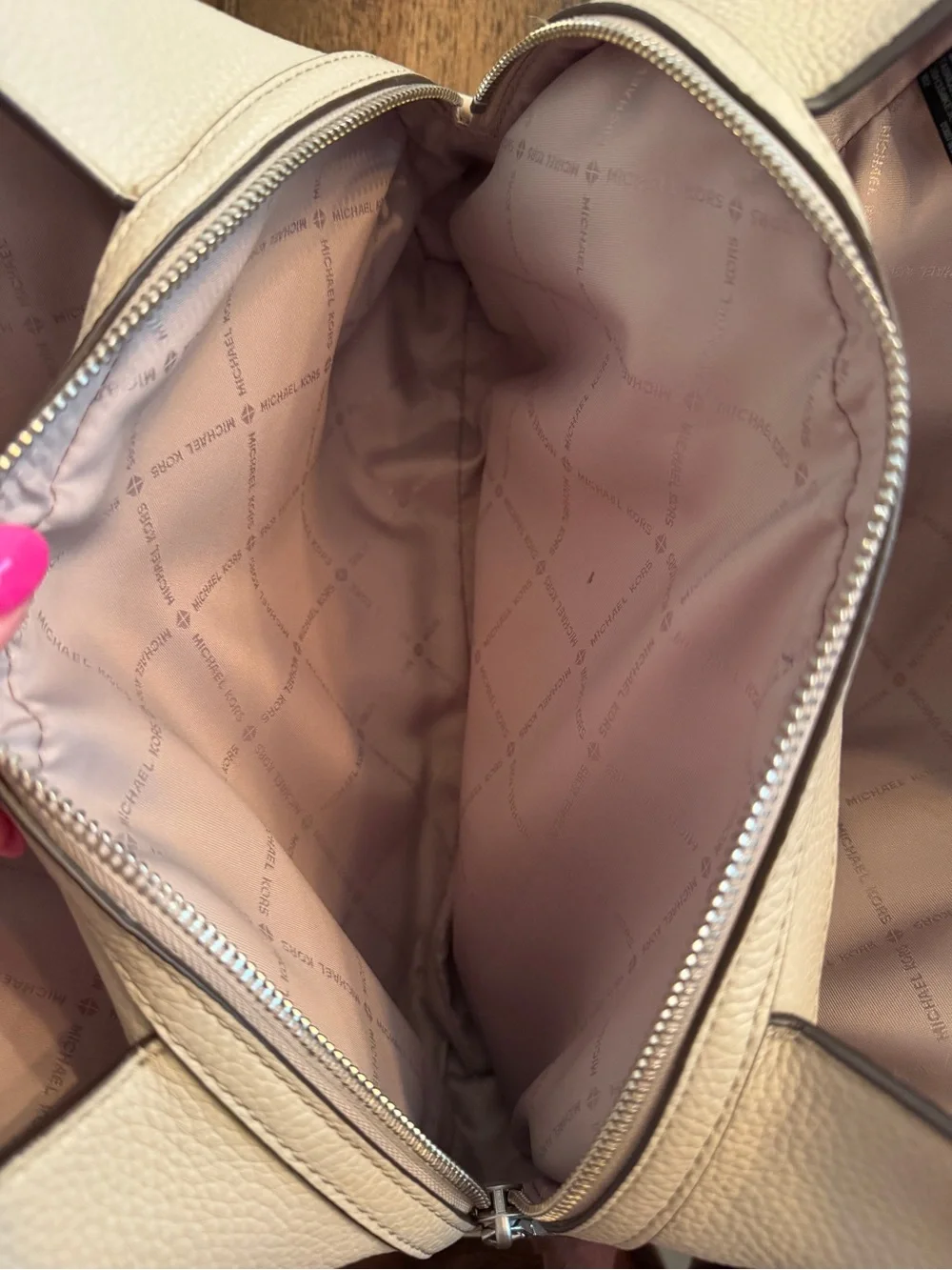 Michael Kors Raven pebbled leather shoulder bag featuring silver-tone hardware